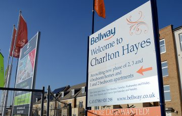Photo of house builders' advertising signs at Charlton Hayes.
