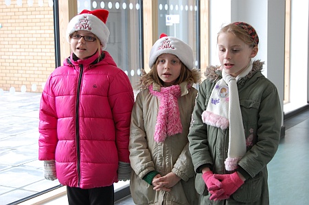 Children from Callicroft Primary School sing Christmas carols