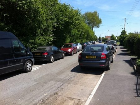 Inconsiderate parking in Hempton Lane, Patchway, Bristol.