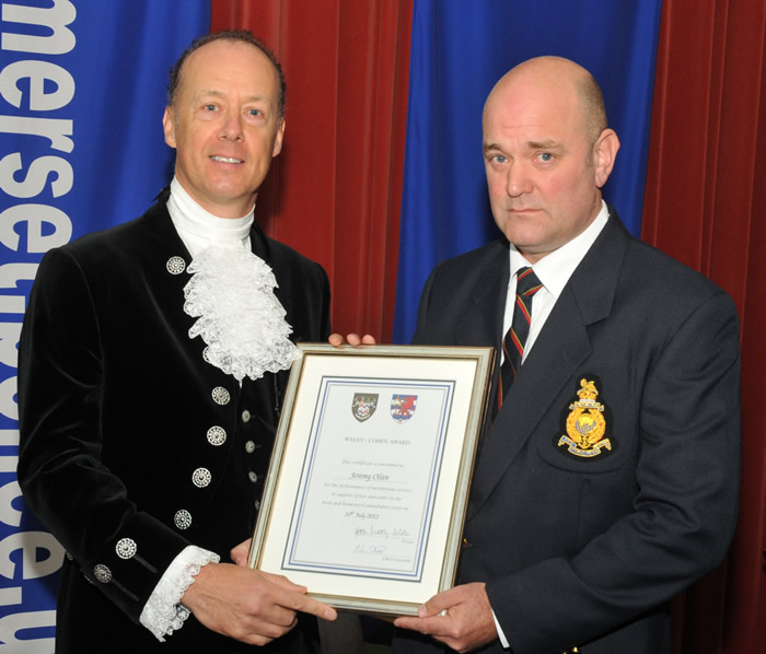 Ex-marine Jeremy Olive receives the Waley-Cohen Award.