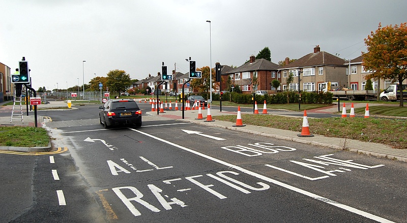 A car ignores the new 'bus only' restrictions on Highwood Road, Patchway.