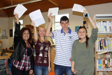 Students at Patchway Community College celebrate their A-level results.