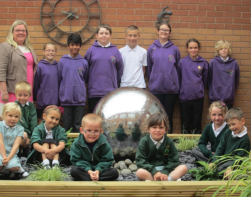 Callicroft Primary School pupils celebrate a 'good' Ofsted report.