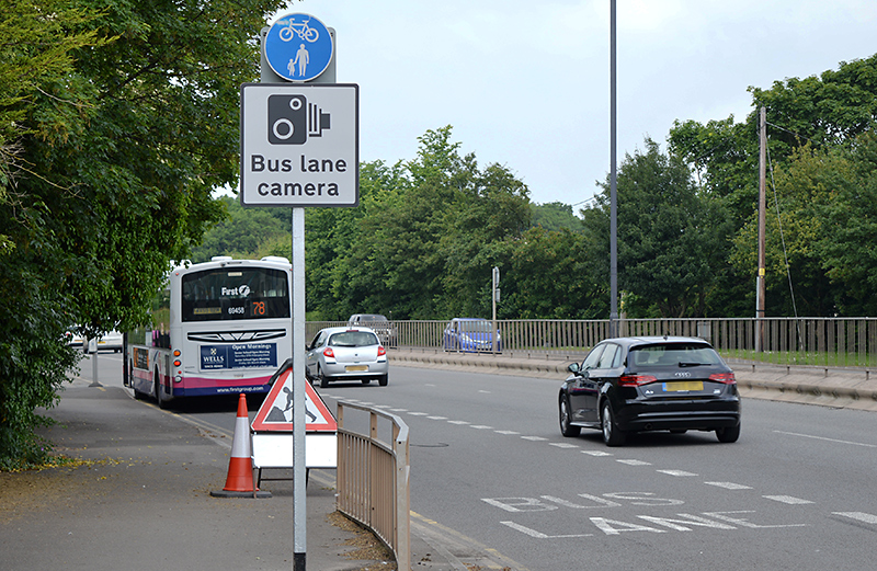 Bus lane enforcement camera sign on the Gloucester Road (A38) northbound approach to the Aztec West Roundabout.