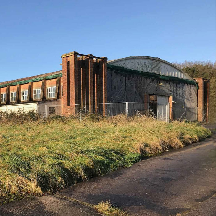 Photo of a historic aircraft hangar.