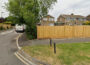 Photo of a wooden fence on the boundary of a residential property.